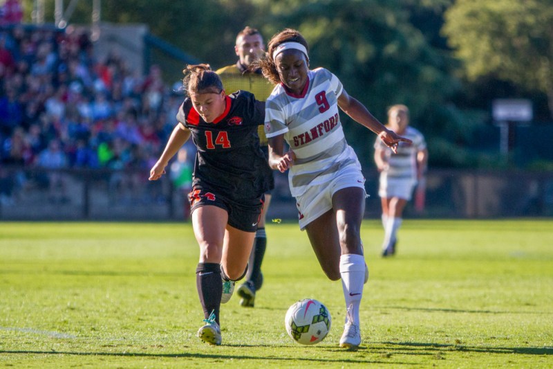 Senior forward Chioma Ubogagu (right) notched a second-half hat trick as the top-seeded Cardinal roared back from an early 2-0 deficit to roll over Cal State Fullerton by a score of 5-2.  (ROGER CHEN/The Stanford Daily)