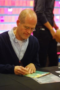 Chris Ware signing his graphic novels outside of Cemex auditorium. Photo by Gabriela Groth.