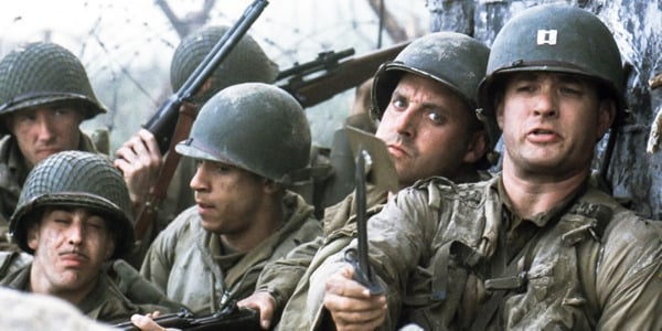 Still from "Saving Private Ryan": Tom Hanks shows a little ingenuity as he commands his men on D-Day in Steven Spielberg’s World War II drama. Courtesy DreamWorks.