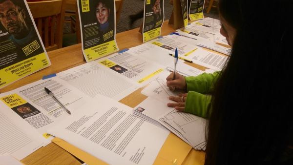 Stanford Amnesty International members write letters to political figures each week. (Photo Courtesy of Emily Witt)