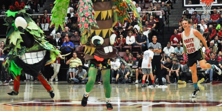 Sarah Young '17 (center) is the first woman of color to be selected as The Tree, the Band's mascot (RAHIM ULLAH).