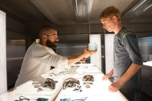 (l-r) Oscar Isaac and Domhnall Gleeson in "Ex Machina." Courtesy of Universal Pictures. 