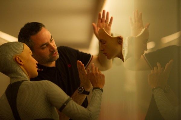 (l-r) Alicia Vikander and Alex Garland on the set of Ex Machina. Courtesy of Universal Pictures.