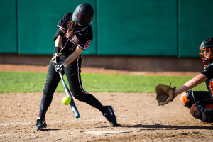 In Stanford's high-scoring contest against Saint Mary's, senior Hanna Winter (above) continued to maintain her tremendous form of the last month of the season with an RBI single as part of a 5-for-5, 2-RBI day. Winter's outstanding day was not enough, however, as the Cardinal lost by one run. (FRANK CHEN/The Stanford Daily)