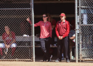 Stanford softball coach Rachel Hanson (center), hired to replace Rittman, struggled to erase the divisions present on the team at her arrival. (ARIEL HAYAT/The Daily Californian)