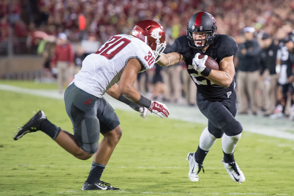 Stanford fans were upset that sophomore Christian McCaffrey (right), who quickly emerged as one of the most dynamic playmakers on Stanford's offense, wasn't given more opportunities to make plays by head coach David Shaw. With Shaw having gone on record to say that the offense will run through McCaffrey in 2015, the hype for the young running back is off the charts. (DAVID BERNAL/isiphotos.com)