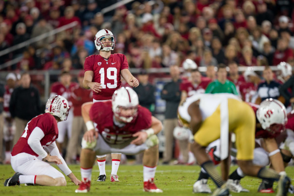 After a four-year career as Stanford's starting kicker, Jordan Williamson '15 (top) departed Stanford as the program's all-time leading scorer despite prolonged bouts of inconsistency. Senior Conrad Ukropina and freshman Charlie Beall will compete for his vacated position in 2015. (BOB DREBIN/isiphotos.com)