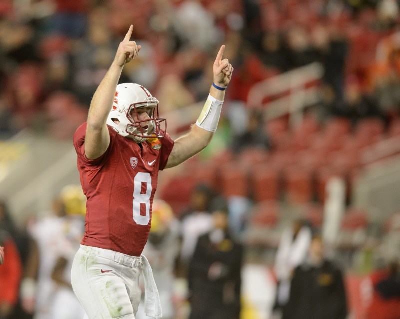 Much of Stanford's fate in 2015 relies on how its fifth-year senior quarterback Kevin Hogan (above) performs. Hogan has struggled with inconsistency in the past, but had a strong end to the 2014 season.  (DON FERIA/isiphotos.com)
