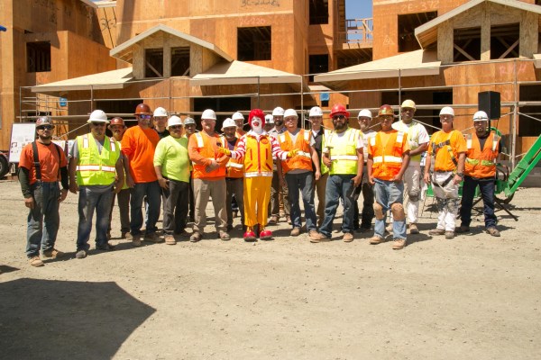 The construction team from Vance Brown poses with Ronald McDonald at the topping off ceremony for Ronald McDonald House at Stanford.  (Courtesy of Larriva Productions)