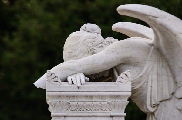 The vandalized Angel of Grief statue is missing its left forearm. (SAM GIRVIN/The Stanford Daily)