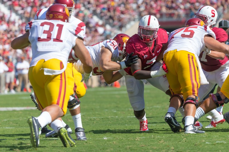 The announcement that Nate Lohn will miss the USC game due to injury means that fifth-year senior Brennan Scarlett, senior Aziz Shittu (center) and sophomore Solomon Thomas will likely be tasked with playing almost the full 60 minutes against USC's up-tempo offense on Saturday. (BOB DREBIN/stanfordphoto.com)
