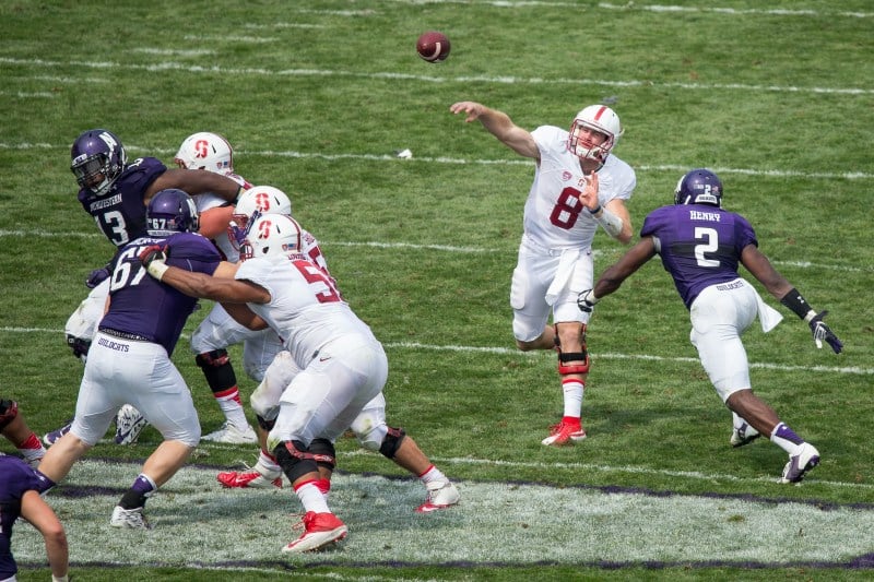 Fifth-year senior quarterback Kevin Hogan (right) was 20-of-35 in his return to the field as the Cardinal only mustered 240 yards of offense in an ugly 16-6 defeat to Northwestern. (BOB DREBIN/isiphotos.com)