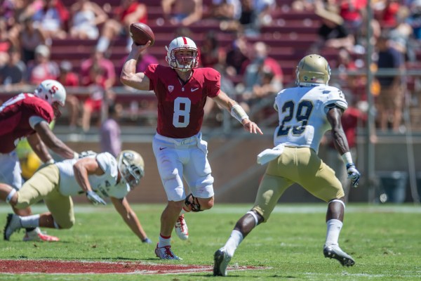 Kevin Hogan (center) faces Arizona for the first time in his career on Saturday. Hogan is coming off two strong performances against USC and Oregon State, in which the offense totaled 83 points. (DAVID BERNAL/isiphotos.com)