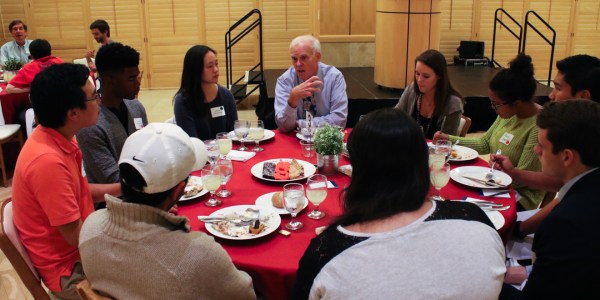 Roughly 200 students attended the OpenXChange Listening Dinner on Monday. At least one University administrator sat at each table to listen to students' concerns. (MARK McNEILL/The Stanford Daily)