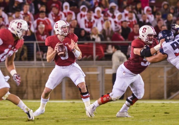 After a rocky start to the 2015 campaign, Kevin Hogan (middle) led the Cardinal to the No. 3 spot in the final AP poll.  (KEVIN HSU/The Stanford Daily)