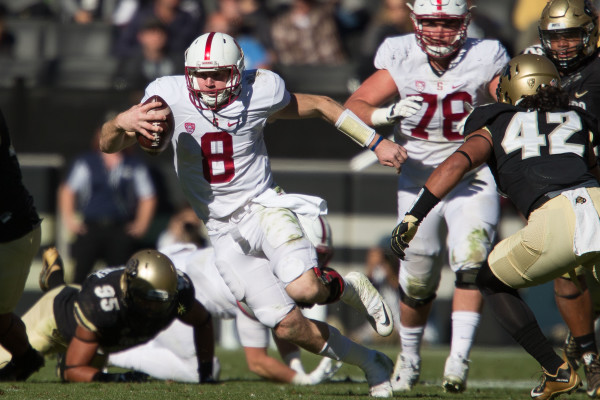 With Stanford's win on Saturday, fifth-year senior quarterback Kevin Hogan (center) became Stanford's all-time leader in wins as starting quarterback, with 32. He also made his 42nd career start, tying for the program lead with Steve Stenstrom. (DON FERIA/isiphotos.com)