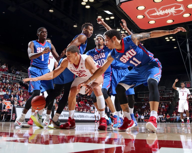 Amidst some uncertainty in the starting lineup and in who head coach Johnny Dawkins can play, due to several preseason injuries, sophomore post Reid Travis (center) has been a consistent contributor, averaging 14.8 points per game and shooting 65 percent from the field. (BOB DREBIN/isiphotos.com)