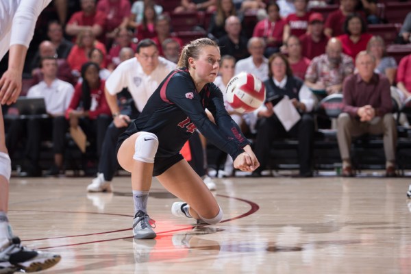 Libero Halland McKenna (above) had a career day against No. 19 Arizona, notching a career-high 27 digs. It was the freshman's second time registering over 20 digs this season (MIKE RASAY/isiphotos.com).