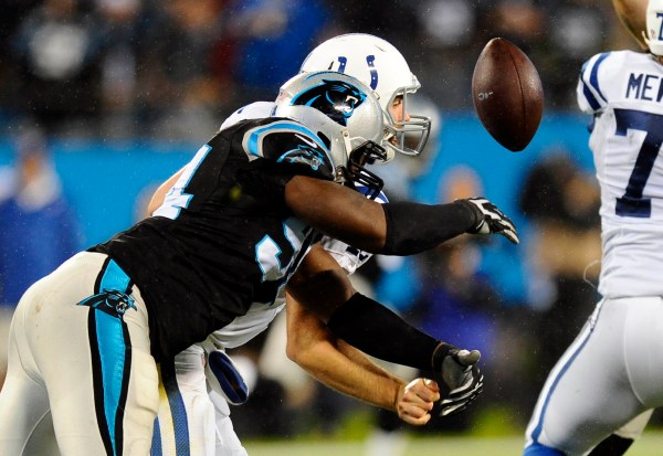 Andrew Luck '12 (behind) struggled Monday night against the Panthers, throwing 3 picks and notching a fumble. The Colts would go on to lose 29-26 in overtime.
