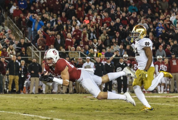 Devon Cajuste (left) connected with Kevin Hogan for a 27-yard catch to bring Stanford into field goal range, giving kicker Conrad Ukropina the opportunity to win the game with a 45-yard field goal. Cajuste ended the night with 5 receptions for 125 yards, a season-high. (SAM GIRVIN/The Stanford Daily)
