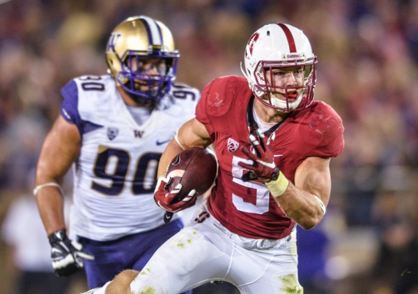Sophomore running back and Heisman candidate Christian McCaffrey (right) is currently leading Stanford with an average of 134.1 rushing yards per game. He will be looking to do damage against the Oregon defense on Saturday as the Ducks historically have had trouble stopping Stanford's power run game. (RAGHAV MEHROTRA/The Stanford Daily)