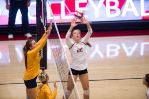 Setter Madi Bugg (center) tied her fifth-best performance of the season with 49 assists in the Cardinal's 3-1 victory over Cal. (RAHIM ULLAH/The Stanford Daily)