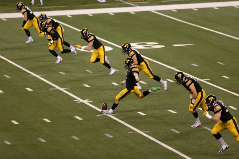 Iowa kicker Marshall Koehn kicks the ball at the top of the second half during the Big Ten Championship against Michigan State in Lucas Oil Stadium in Indianapolis, Indiana on Saturday, Dec. 5, 2015. The Spartans defeated the Hawkeyes, 16-13. (Alyssa Hitchcock/The Daily Iowan)