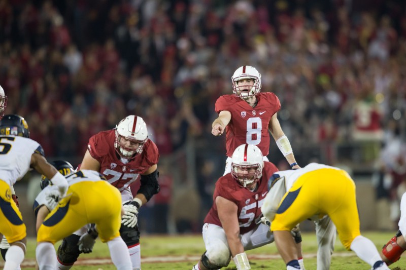 Kevin Hogan (right) will finish his career as the winningest active quarterback in the FBS, but he could also lead his team to its second Rose Bowl victory in four years with a win on Friday. (CASEY VALENTINE//isiphotos.com)