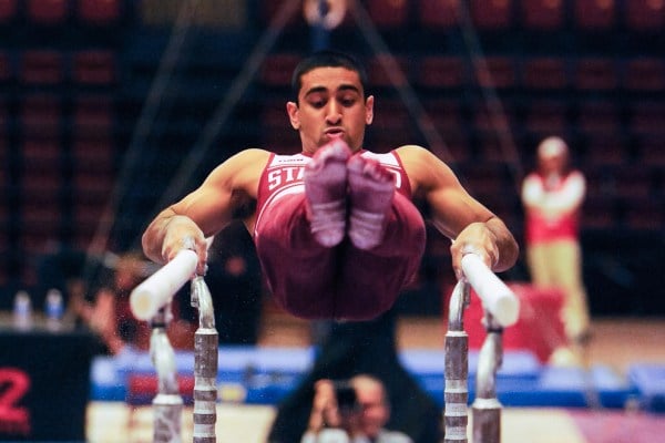 Junior Akash Modi won four of his six events as well as the all-around title in last weekend's meet against No. 3 Ohio State and No. 5 Cal. Modi also posted a career-best 16.000 on floor and a season-best 15.250 on parallel bars. (MIKE KHEIR/The Stanford Daily)