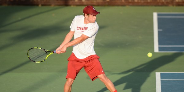 Stanford freshman Michael Genender (above) bounced back from a tough loss last week against Columbia to earn the team's first singles point against SDSU, setting the tone for a dominant 7-0 victory. (SAM GIRVIN/The Stanford Daily)