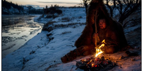 Hugh Glass (Leonardo DiCaprio) struggles to stay warm during a vicious winter in A.G. Iñárittu's "The Revenant."