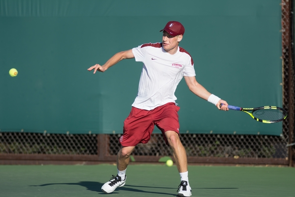 Michael Genender (above) returned to the starting lineup against UCLA after suffering a dramatic three-set loss against Cal last week. The freshman bounced back for a 6-1, 6-4 victory on Court 6, but Stanford still fell, 4-3.(RAHIM ULLAH/The Stanford Daily)