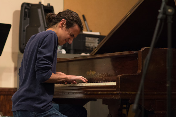 Pianist Alex Sherman playing his original composition, "Io." (RAHIM ULLAH/The Stanford Daily)