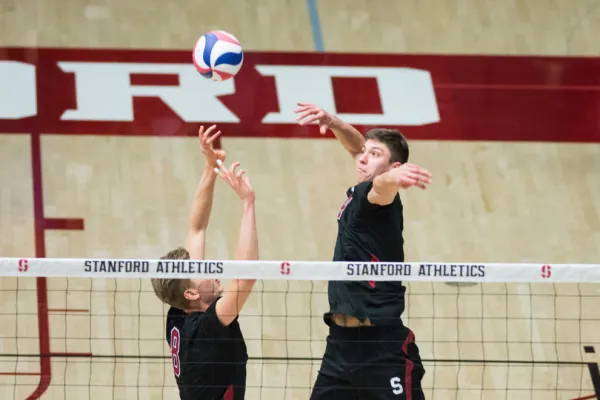 Senior middle Conrad Kaminski (right) notched his first career double-double with a career-high 11 kills and 10 blocks against USC before leading the team again with 7 blocks in the Cardinal's victory over Cal Baptist. (RAHIM ULLAH/The Stanford Daily)