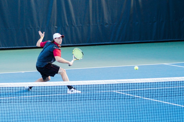 Junior Yale Goldberg (above) and his partner freshman Sameer Kumar won against both USC and UCLA last weekend. This weekend, the men's tennis team takes on Oregon in another conference matchup. (LARRY GE/The Stanford Daily)