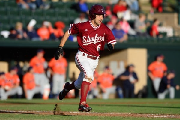 Senior Johnny Locher (above) hit a go-ahead home run in the top of the ninth to propel Stanford to a victory over Cal. The Cardinal will take on UCLA in a three-game series this weekend.  (RAHIM ULLAH/The Stanford Daily)