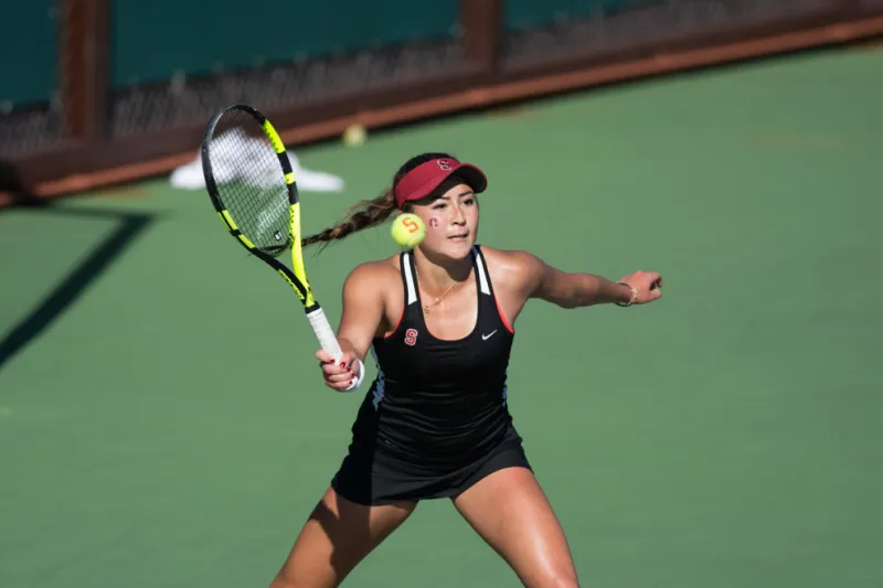 Freshman Caroline Lampl (above) gave the Cardinal the clincher against No. 1 Cal at Taube on Saturday to hand the Bears their first loss of the season and keep Stanford alive in the Pac-12 regular season title race. (RAHIM ULLAH/The Stanford Daily)