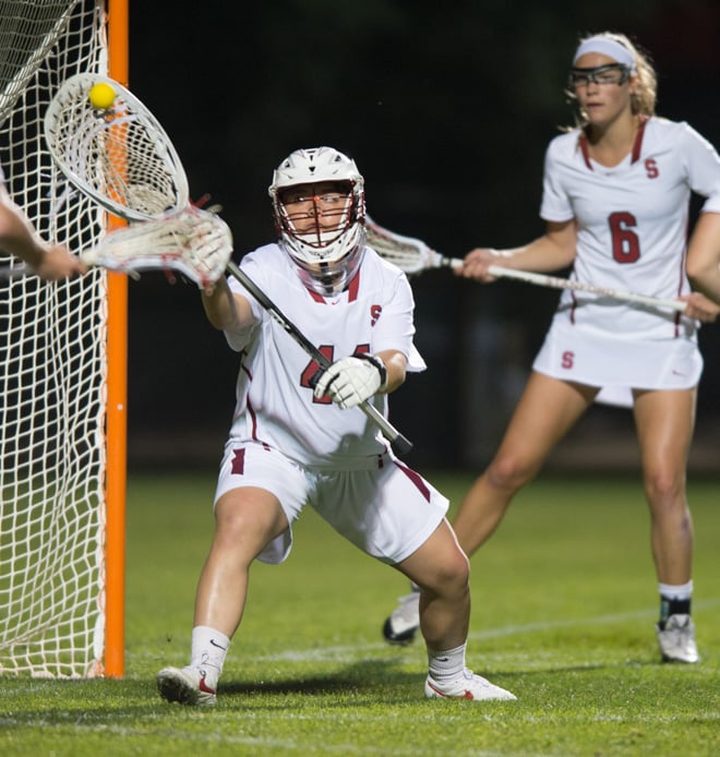 Goalie Allie DaCar (left) has tallied 99 saves in a very successful season. Lacrosse will look to continue its unbeaten conference streak when it takes on undefeated USC in Los Angeles. (JOHN TODD/isiphotos.com)