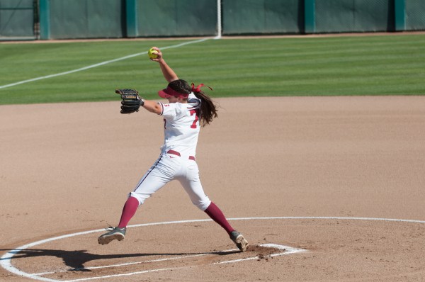 Freshman pitcher Carolyn Lee (above) has been a reliable force in the circle for the Cardinal this season. Up next, she and the team will take on California, the alma mater of her two older sisters. (COLE GRANDEL/The Stanford Daily)