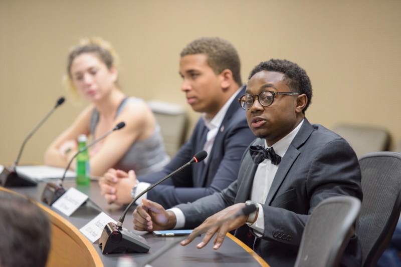ASSU vice-president Brandon Hill speaks at the close of the penultimate faculty senate meeting this year (Courtesy of Stanford News Service).