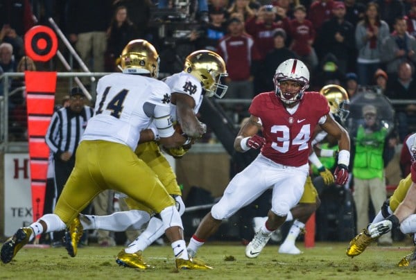 After a strong junior season, senior outside linebacker Peter Kalambayi (right), recently named one of Stanford's five captains, will return to the field in 2016 as one of Stanford's most experienced defenders. 
(SAM GIRVIN/The Stanford Daily)