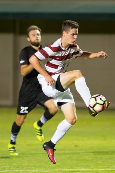 Junior Foster Langsdorf's 86th-minute shot ricocheted off of several defenders, resulting in a San Francisco own goal. That would be Stanford's only score in its 2-1 loss to the Dons. (ANDREW VILLA/The Stanford Daily)