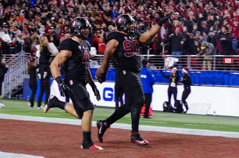 The Stanford-USC game will come down to individual matchups, and the performance of defensive tackle Solomon Thomas (right) may prove key. The junior made his presence felt in the 2015 Pac-12 Championship game, recovering a fumble for a touchdown. (SAM GIRVIN/The Stanford Daily)
