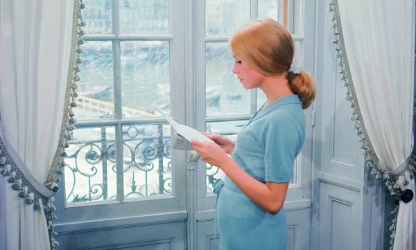 La belle Deneuve in 'The Umbrellas of Cherbourg' (1964) by Jacques Demy. (Courtesy of Janus Films)