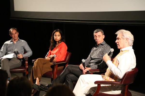 David Byrne and Mala Gaonkar discuss learning and art with Professors Anthony Wagner and Charles Kronengold in Oshman Hall. (CARLOS VALLADARES/The Stanford Daily)