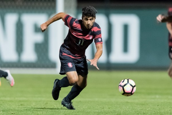 Sophomore midfielder Amir Bashti chases a ball to start an important action in the midfield. Bashti will be an essential piece as the Cardinal takes on San Diego State on Thursday. (JIM SHORIN/isiphotos.com)