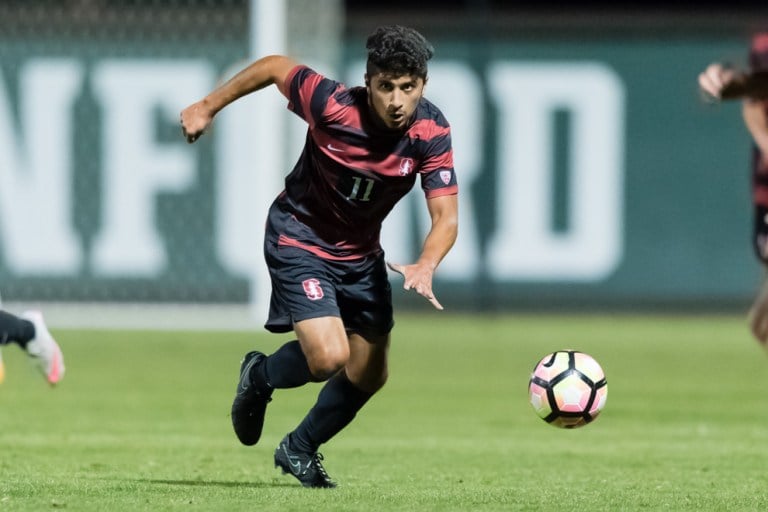 Sophomore midfielder Amir Bashti chases a ball to start an important action in the midfield. Bashti will be an essential piece as the Cardinal takes on San Diego State on Thursday. (JIM SHORIN/isiphotos.com)