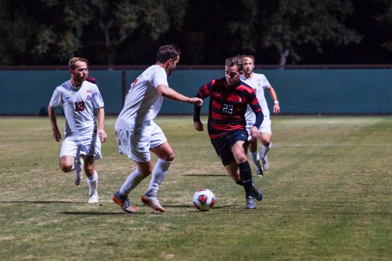 Junior midfielder Sam Werner nearly made a game-winner at the end of regulation, but a clutch save by the Washington goalkeeper. Stanford fell in overtime, snapping its unbeaten conference streak.(LARRY GE/The Stanford Daily)