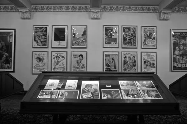 The Stanford Theatre Gallery, a display of original movie posters, articles, and other ephemera related to the current program. Photo: McKENZIE LYNCH/The Stanford Daily.