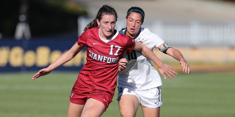 Junior midfielder Andi Sullivan guards the ball as she runs it up the field. Sullivan was an essential piece in the win against Cal Berkeley than clinched the Pac-12 title for the Cardinal. (AL SERMENO/isiphotos.com)